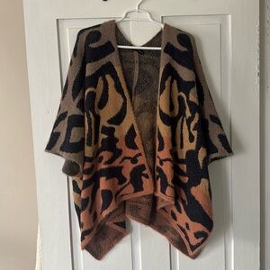 Animal Print On Blue Poncho Sweater